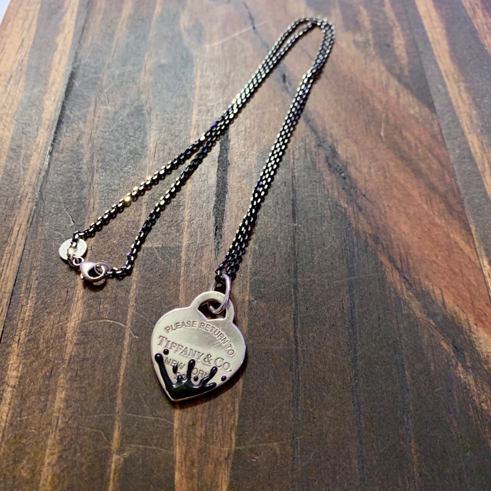 Tiffany & Co charm and necklace.